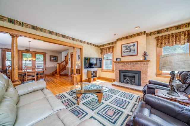 living room featuring a fireplace and hardwood / wood-style floors