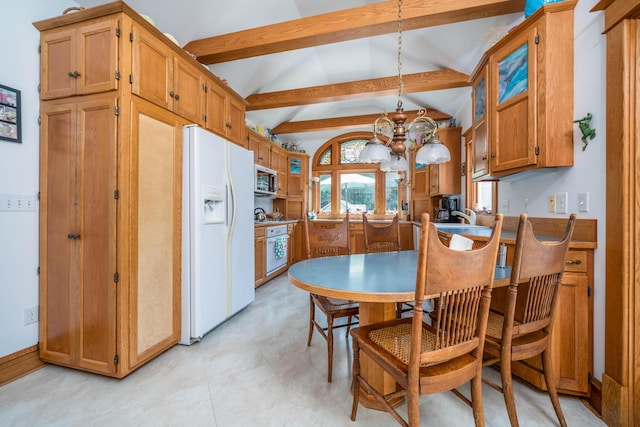 kitchen featuring a notable chandelier, vaulted ceiling with beams, white appliances, and hanging light fixtures