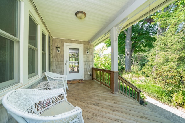 wooden deck featuring a porch