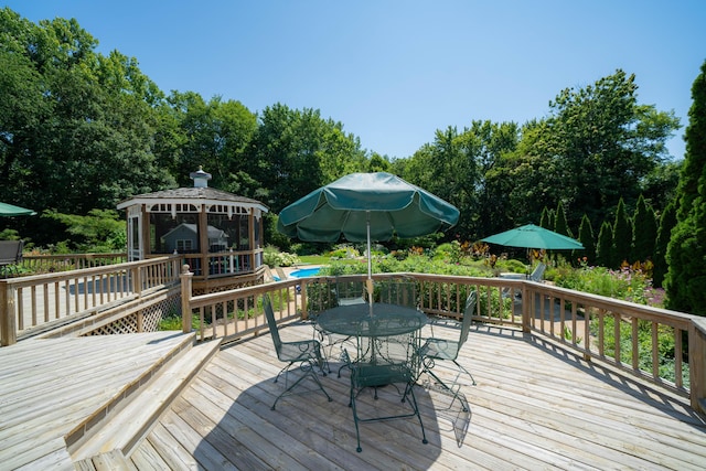 wooden terrace with a gazebo