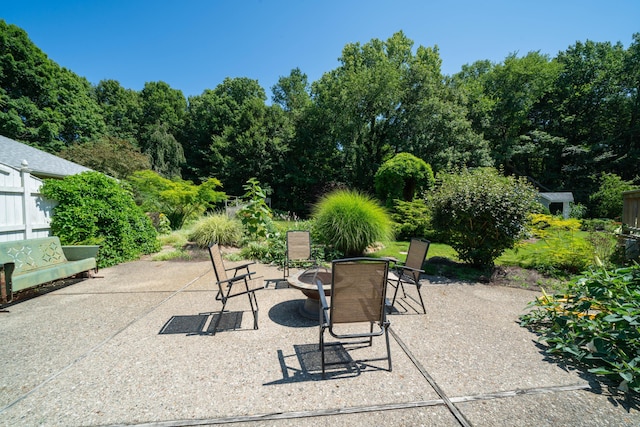 view of patio / terrace with a fire pit