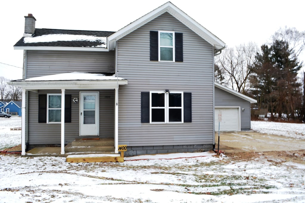 front of property with a garage