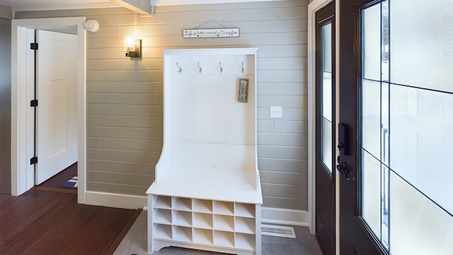 mudroom featuring dark wood-type flooring