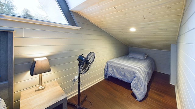 bedroom with wooden ceiling, dark hardwood / wood-style floors, and lofted ceiling