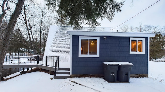 exterior space featuring a wooden deck