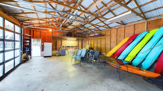 garage with white refrigerator