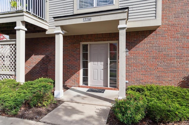 doorway to property with a balcony