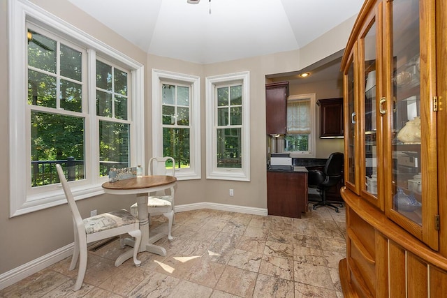 office space with vaulted ceiling