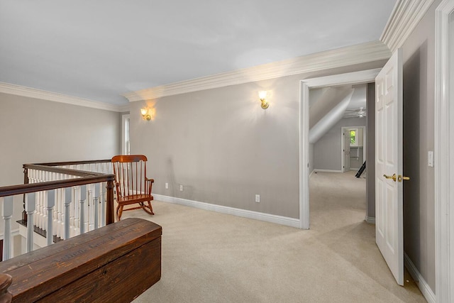 living area with ceiling fan, ornamental molding, and light carpet