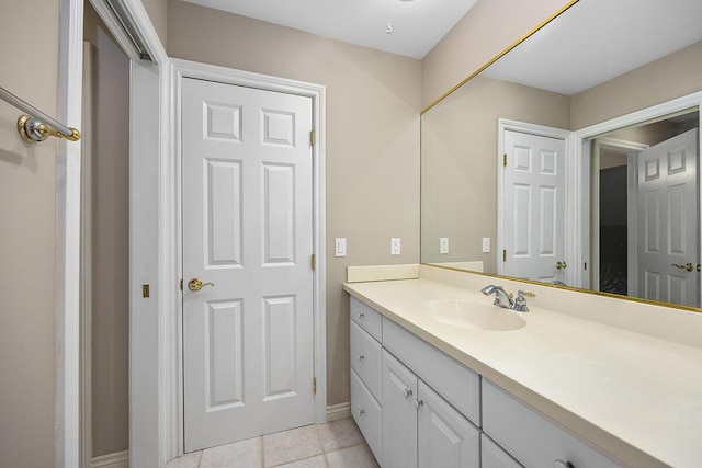 bathroom featuring tile patterned floors and vanity