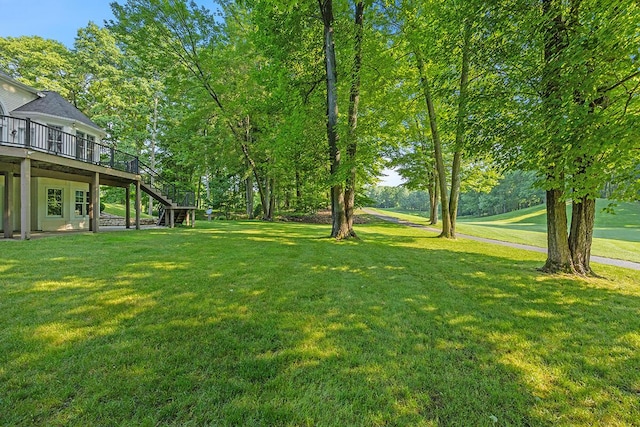 view of yard featuring a deck