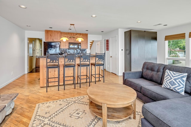 living room with light wood-type flooring