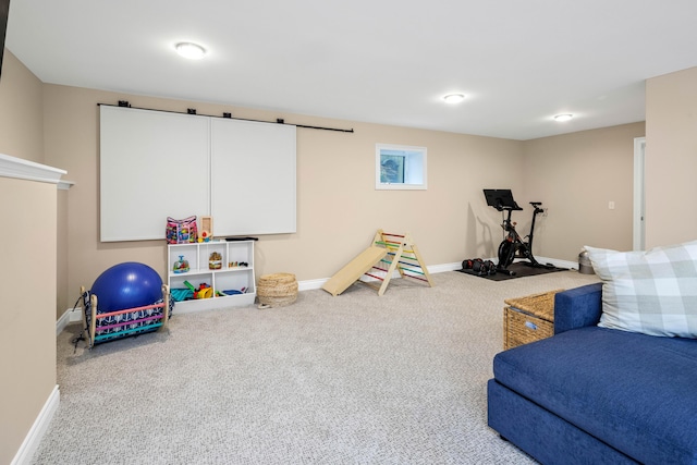 rec room with carpet flooring