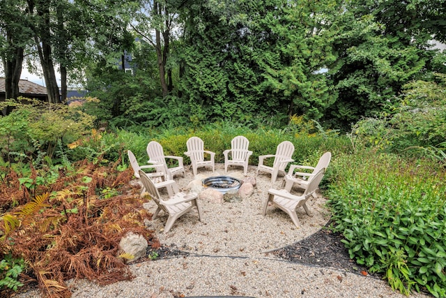 view of patio with an outdoor fire pit