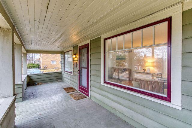 entrance to property featuring covered porch