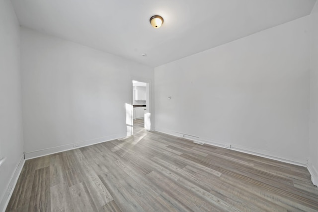 empty room featuring light wood-type flooring