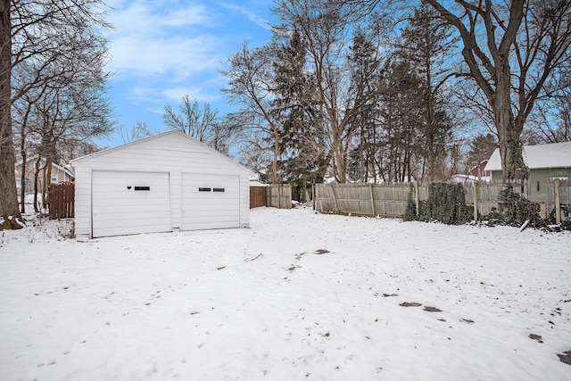 view of snow covered garage