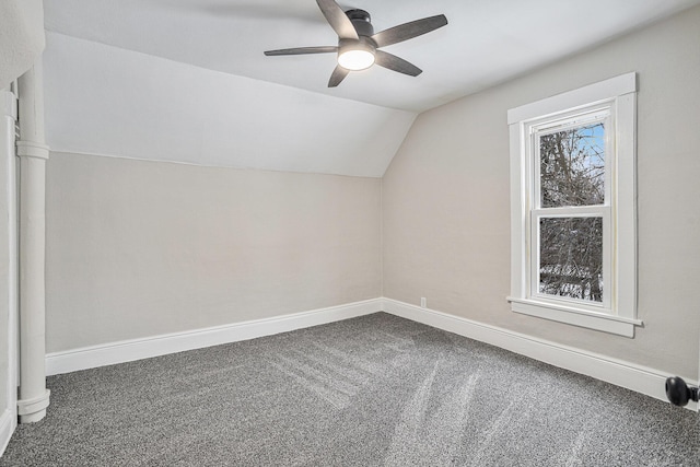 additional living space featuring ceiling fan, carpet, and vaulted ceiling