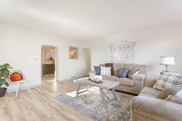 living room with light wood-type flooring