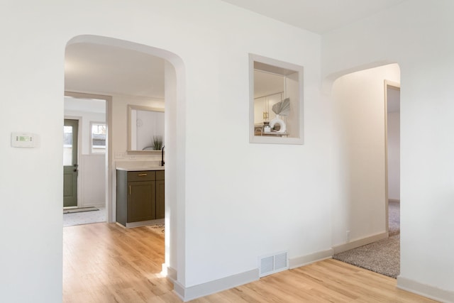 hall featuring light hardwood / wood-style flooring