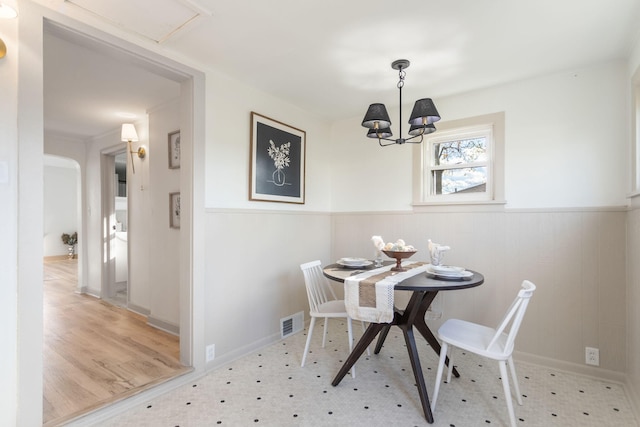 dining area featuring a chandelier