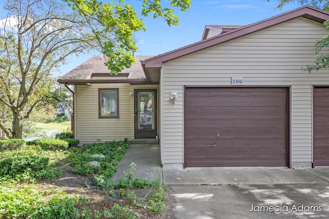 view of front of house with a garage