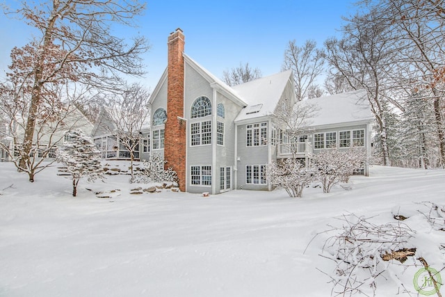 view of snow covered property