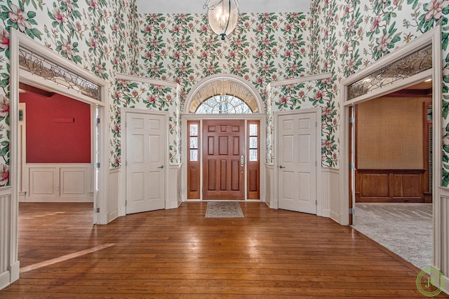 foyer entrance with hardwood / wood-style flooring