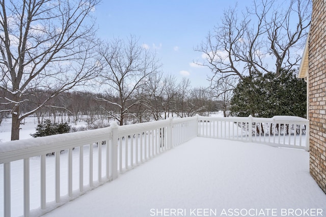 view of snow covered deck