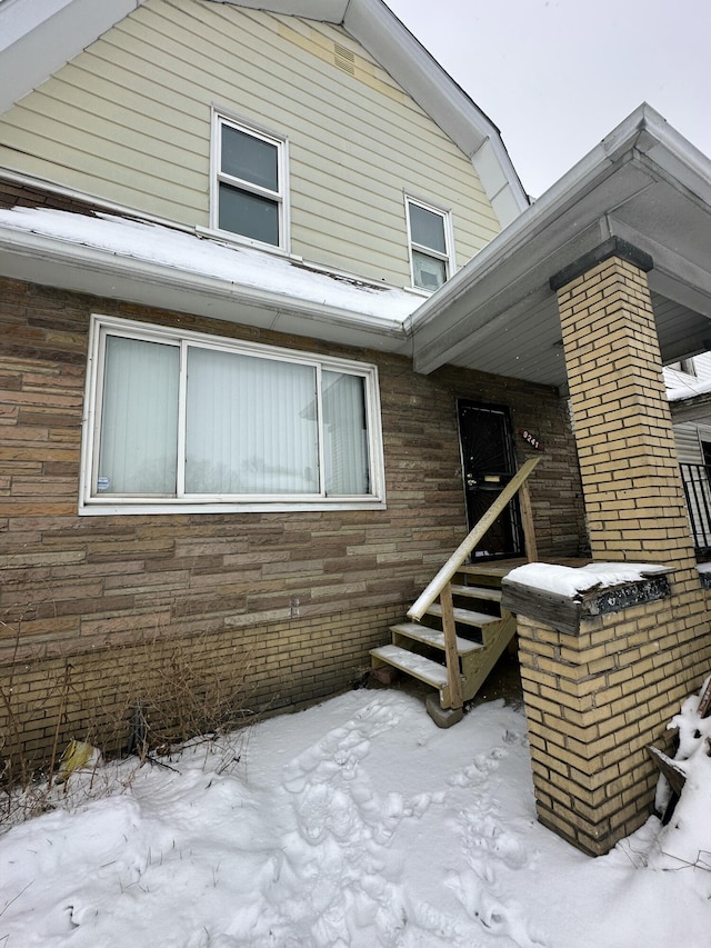 view of snow covered property