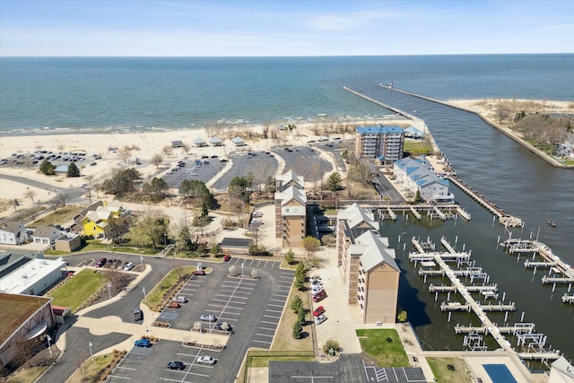 aerial view featuring a water view and a view of the beach