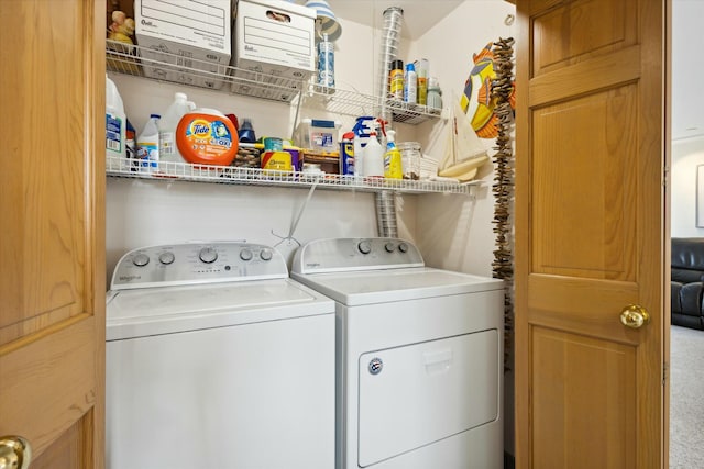 laundry room with washer and clothes dryer