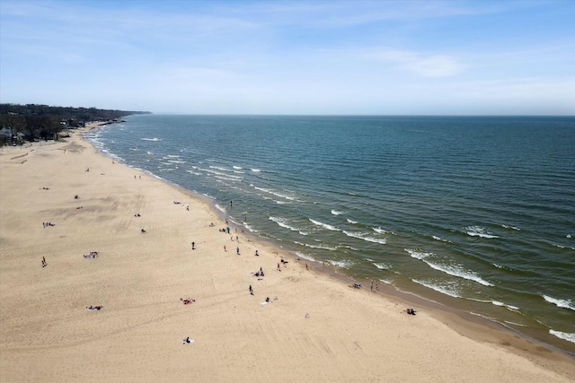 property view of water featuring a beach view