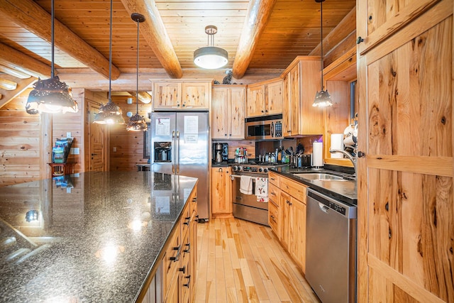 kitchen with stainless steel appliances, wood ceiling, sink, and beamed ceiling