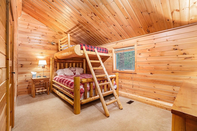 bedroom with wood ceiling, wood walls, lofted ceiling, and carpet