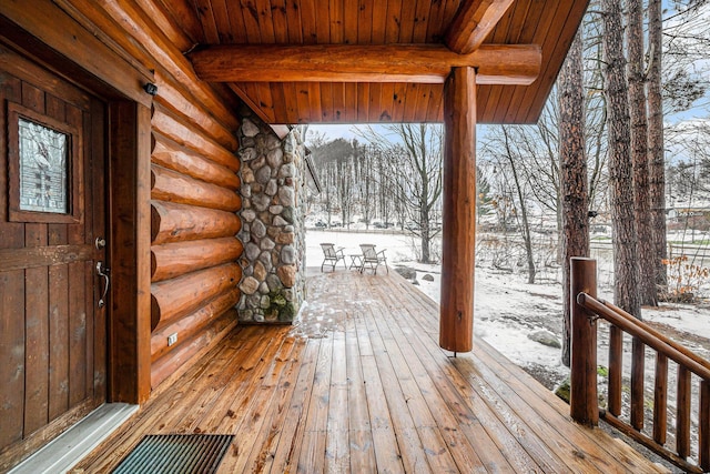 view of snow covered deck