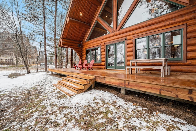 view of snow covered deck