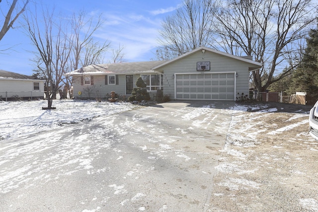 ranch-style home featuring a garage