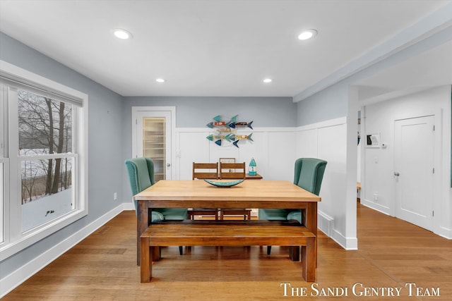 dining area with light hardwood / wood-style flooring