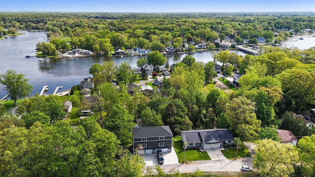 16905 Highland Ave, Spring Lake, MI 49456 - aerial view of a large body of water and a heavily wooded area