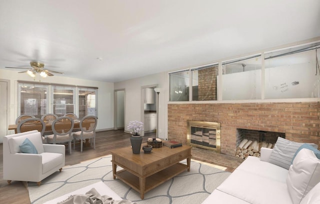 living room with ceiling fan, light hardwood / wood-style flooring, and a fireplace