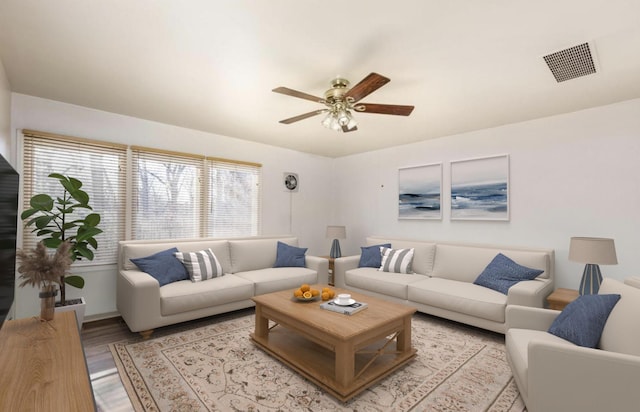 living room with ceiling fan and light hardwood / wood-style flooring