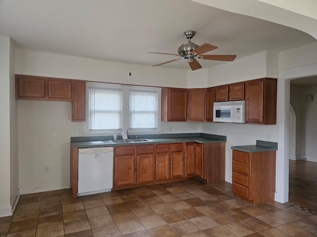 kitchen with ceiling fan, white appliances, and sink