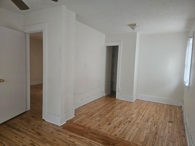 empty room featuring hardwood / wood-style flooring