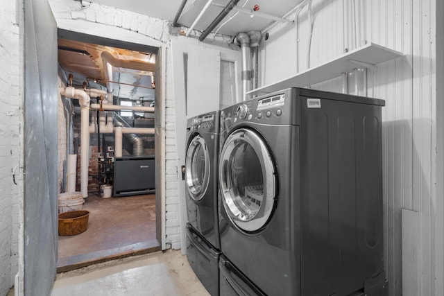 washroom featuring washer and dryer