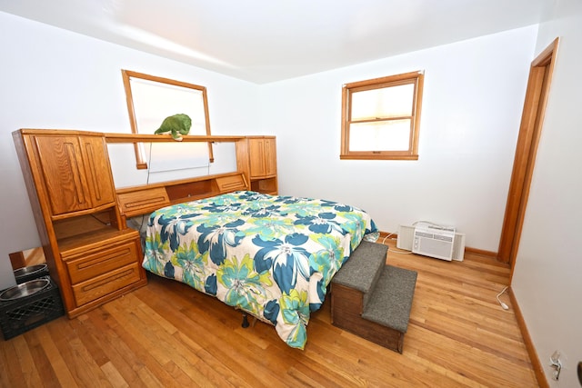 bedroom with light hardwood / wood-style flooring