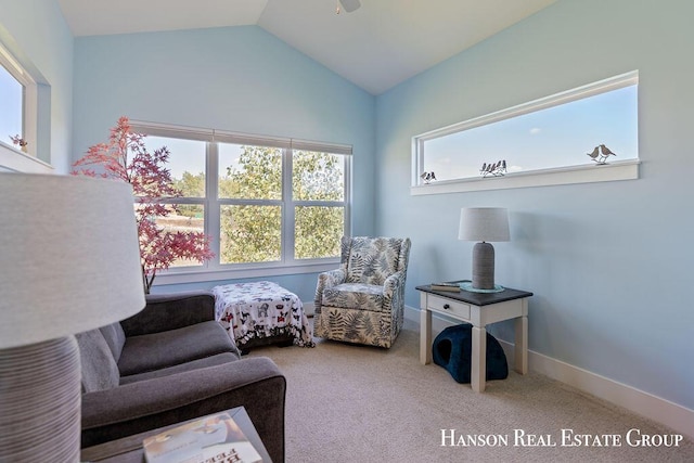 sitting room featuring carpet floors, ceiling fan, and lofted ceiling