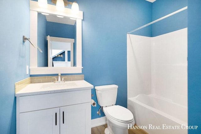 full bathroom with vanity, toilet, and bathing tub / shower combination