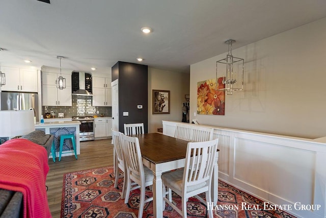 dining room with dark wood-type flooring