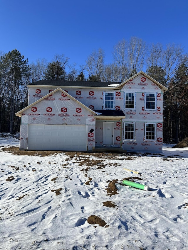 unfinished property with a garage